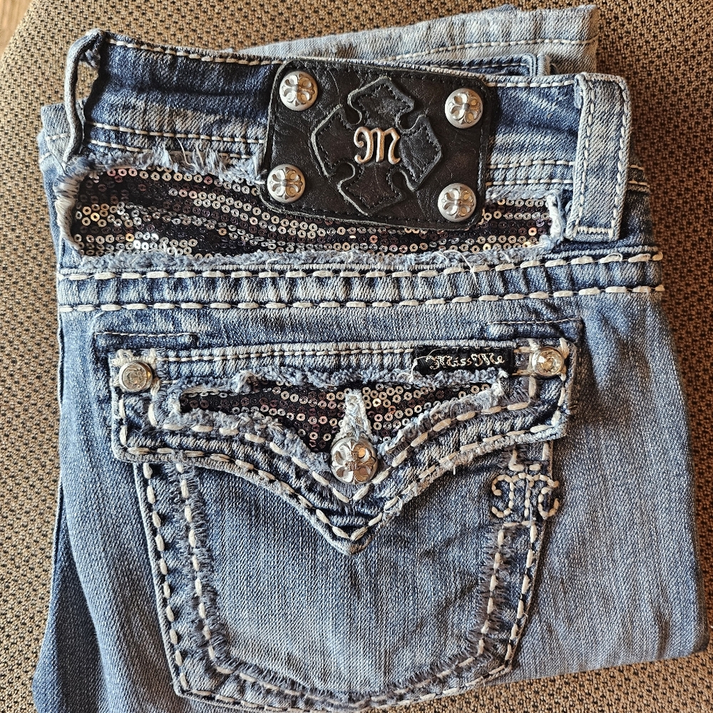 Miss Me faded Slightly distressed jeans